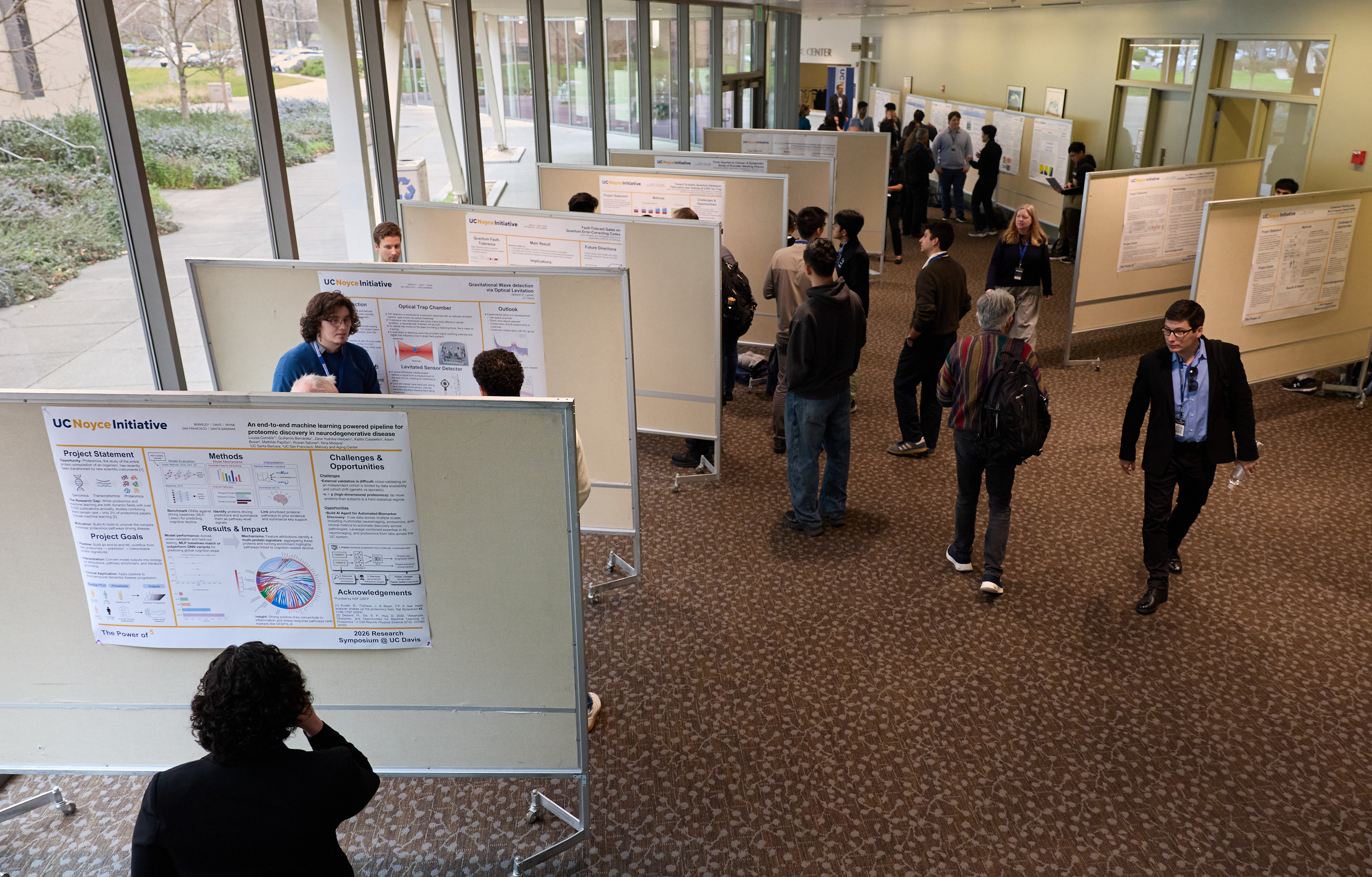 Top down view of poster session in UC Davis conference center lobby