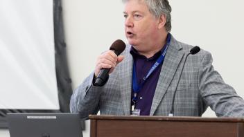 Simon Atkinson at podium