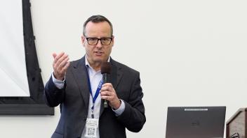 man speaking to a group