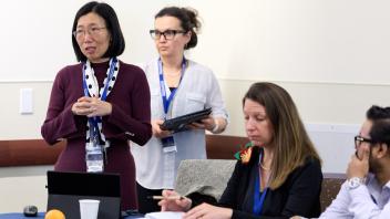 4 people at conference