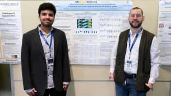 grad students with research poster