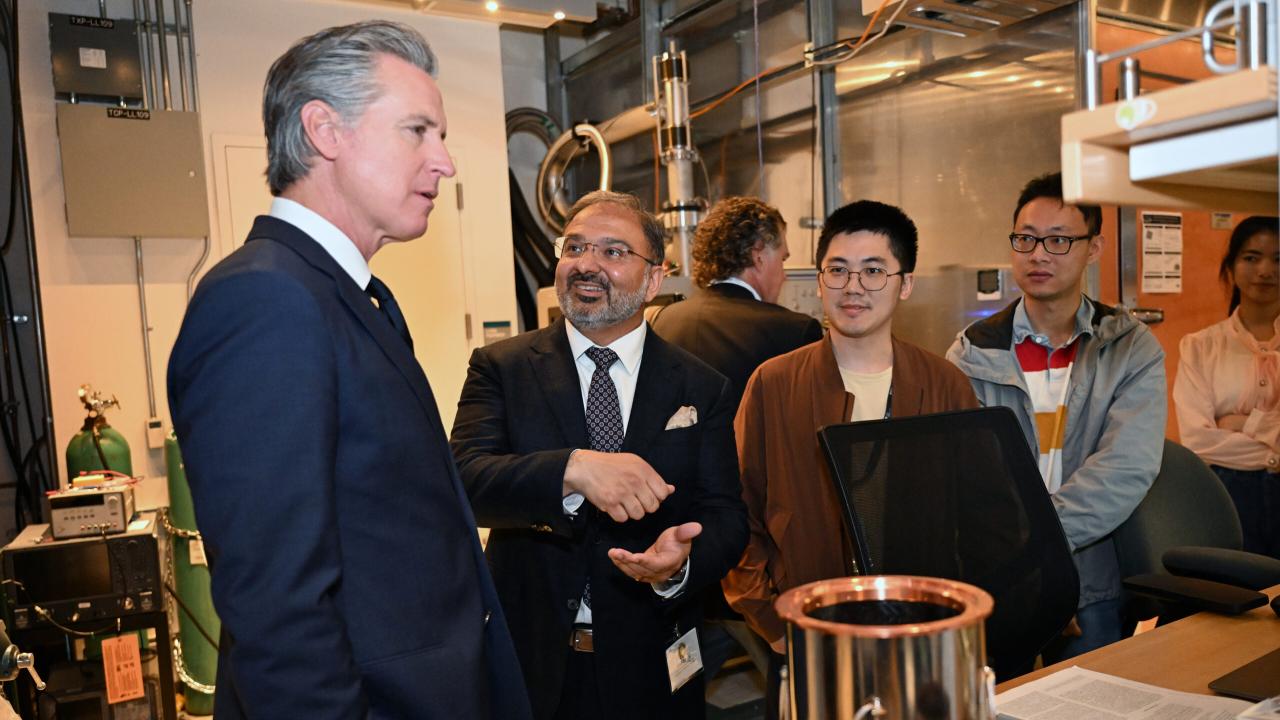 Gov. Gavin Newsom with physics chair Irfan Siddiqi in Siddiqi's quantum lab in the basement of Campbell Hall.