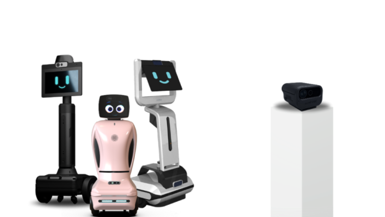 Three robots with computer generated eyes and smiles on screen demonstrate examples of Care Companion Robots