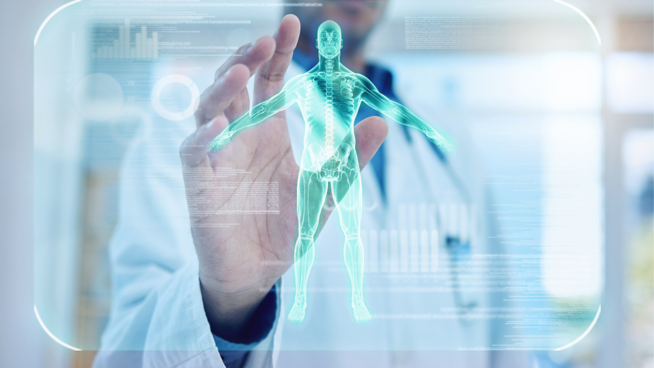 stock image of a doctor reaching toward a futuristic hologram of a human body