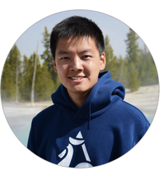 Portrait of Hao-Che Hsu. He has short black hair and is wearing a navy blue hoodie sweatshirt